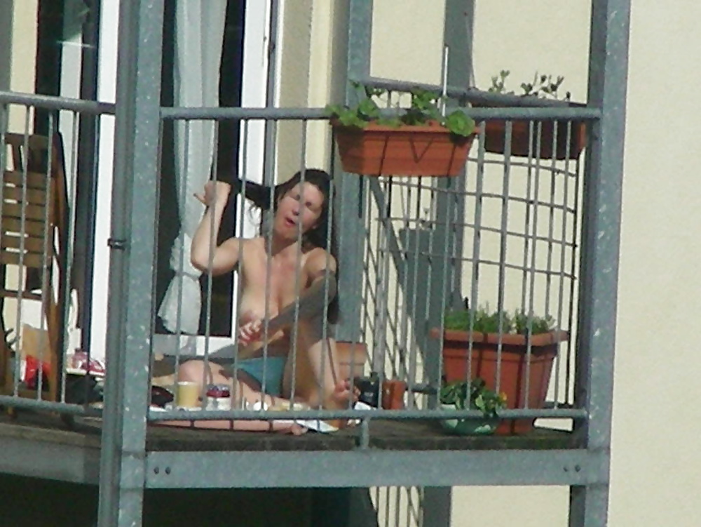 Nude public balcony flash