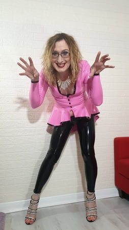 pink riding jacket and black leggings from latex and lovers         