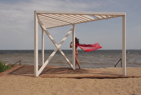 red shawl on windy weather         