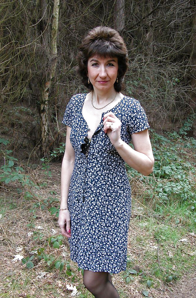 Porn image Amateur mature lady takes a walk in the woods.
