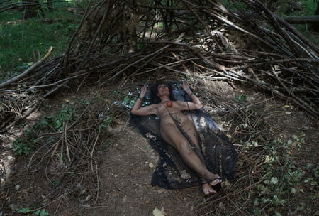 in forest cradle with apple         