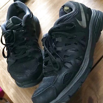 My trashed black nike sneakers