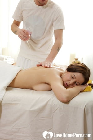 long haired brunette gets a cock from her masseur         