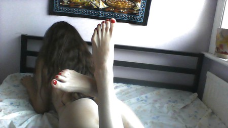 Painted red nails and black high heels