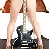 Vicky Vette With An Epiphone Guitar