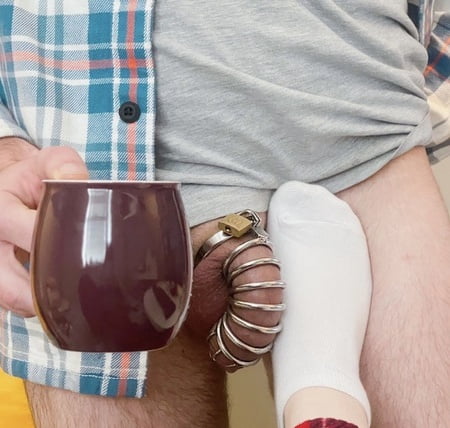 chastity foot slave in his cage         