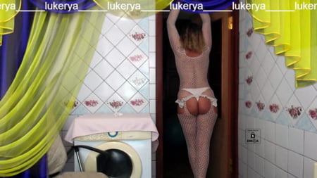 old body of sexy lukerya in white fishnet with visible nippl         