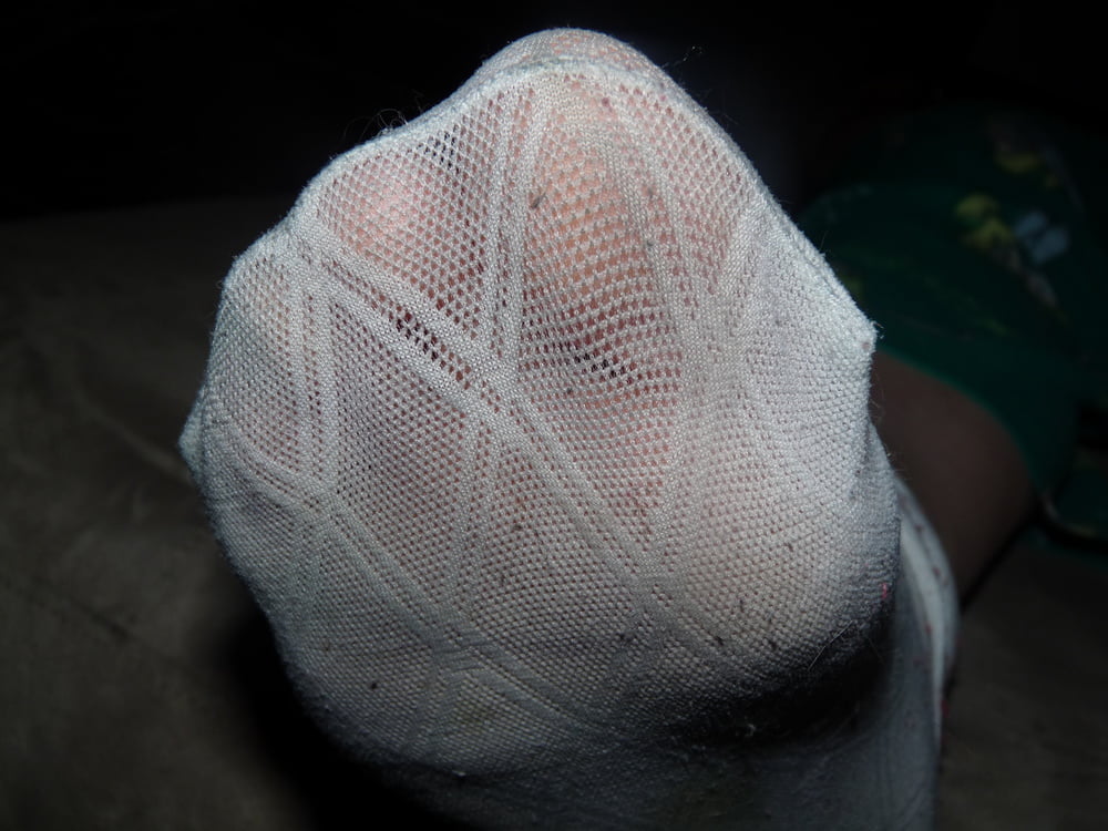 Victoria's feet in socks - 3 Photos 