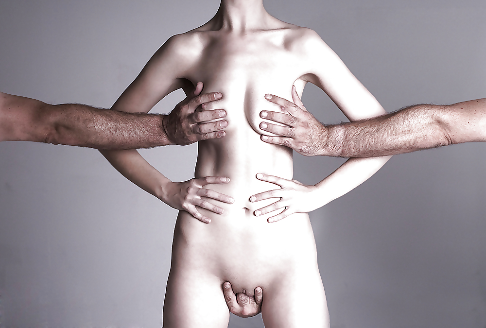 Woman Holds Hands On Belt Of Man With Naked Torso Stock Photo