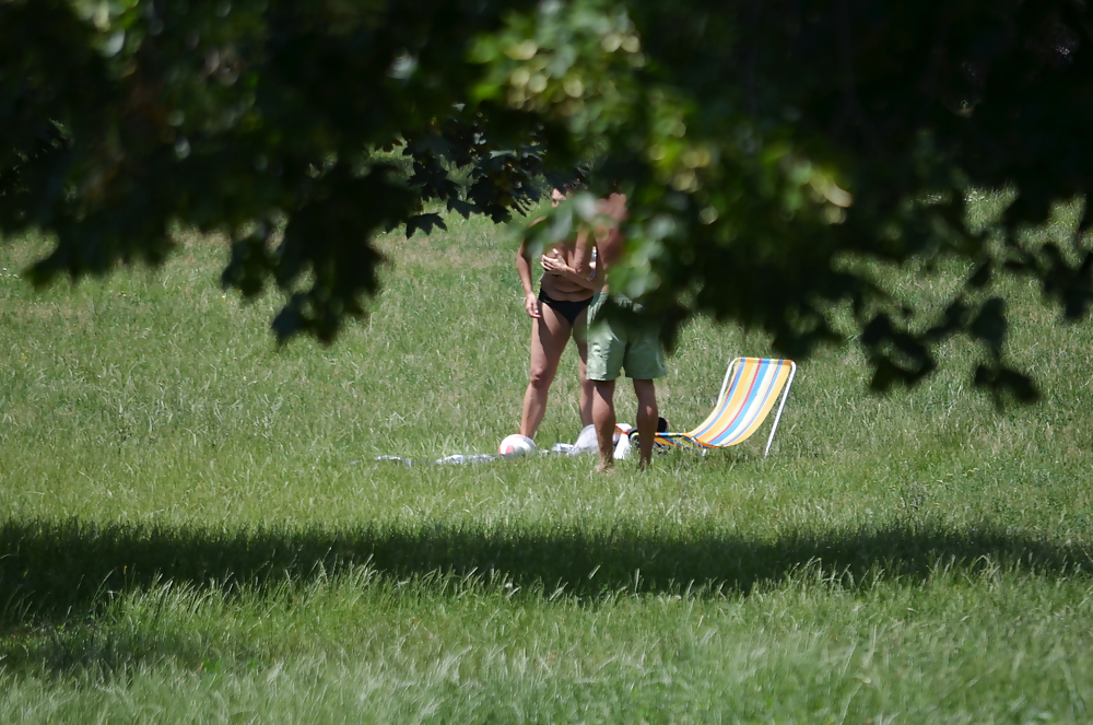 Porn image girl sunbathing in the park I