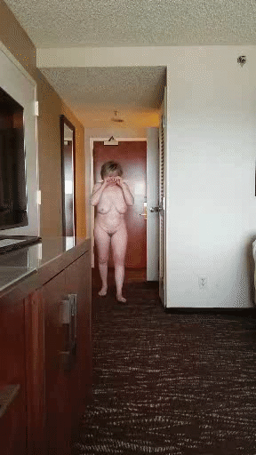 Naked in hotel window GIFs #42