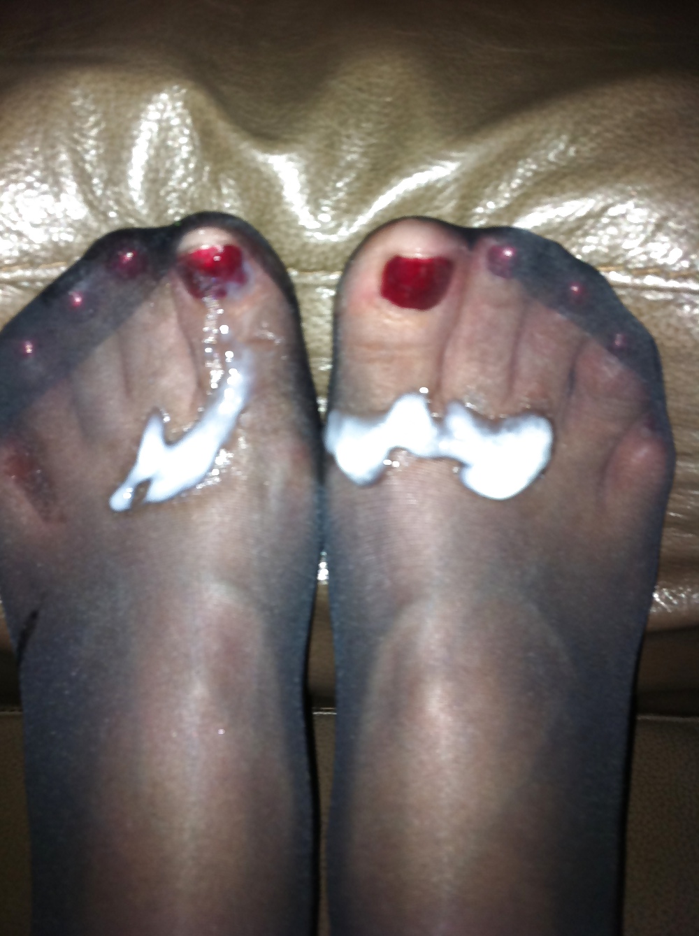 Porn image cumin over my girlfriends stocking feet she licks sum off