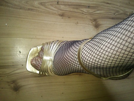 heels and fishnet stockings