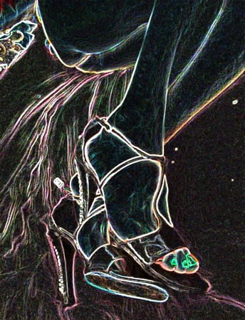 luminous contours of legs heels and ass         