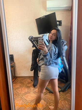 pregnant brunette in sheer pantyhose         