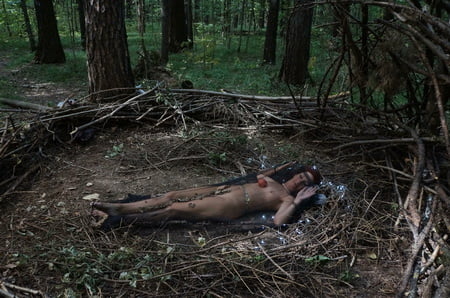 in forest cradle with apple         