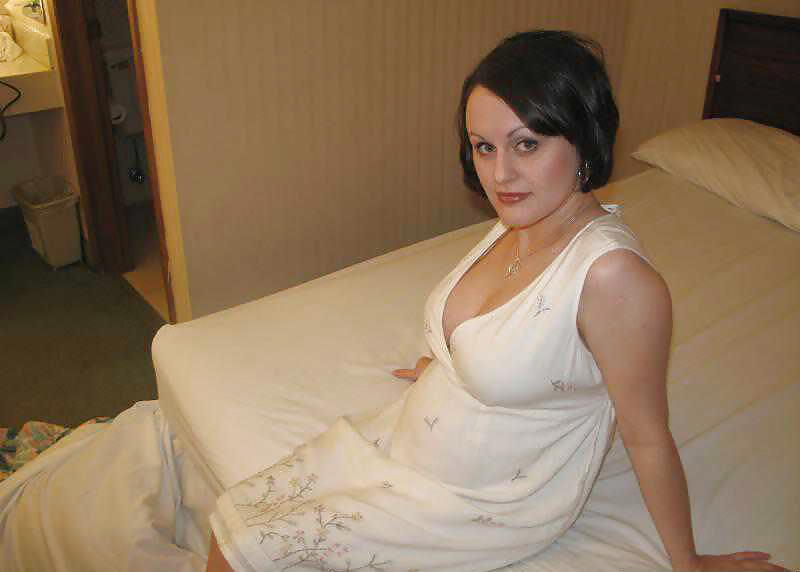Porn image Pregnant brunette Jennifer posing