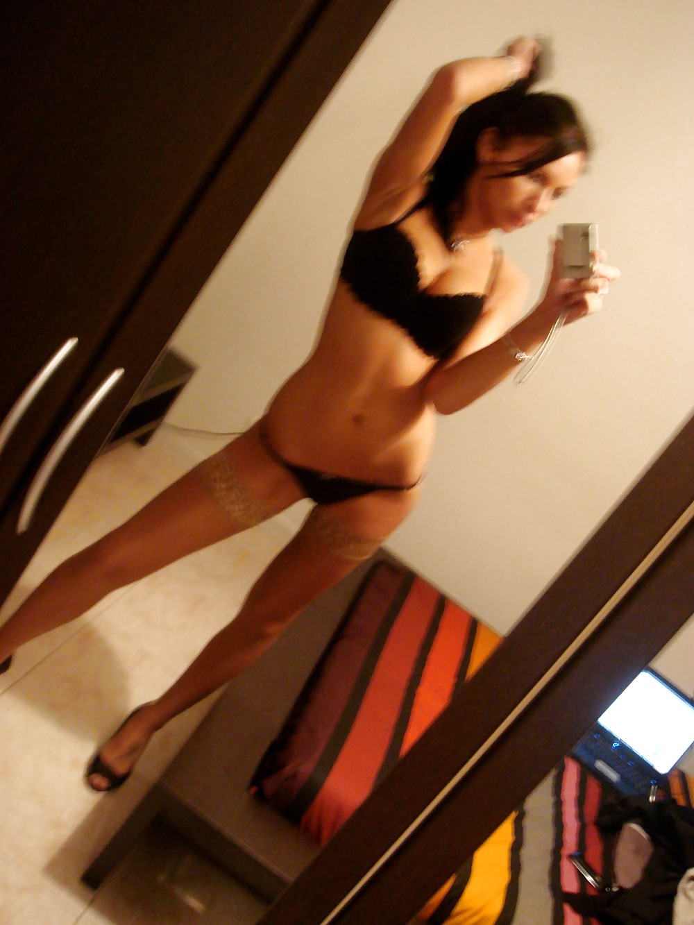 Porn image cute girl in front of her mirror