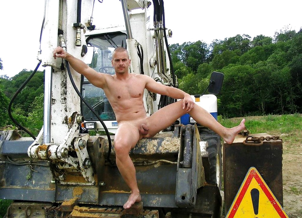 Naked guy in tractor.