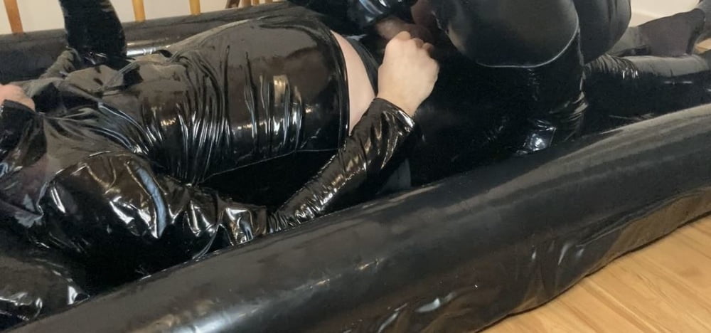 Catsuit, Boots, Corset and Pissing - 26 Photos 