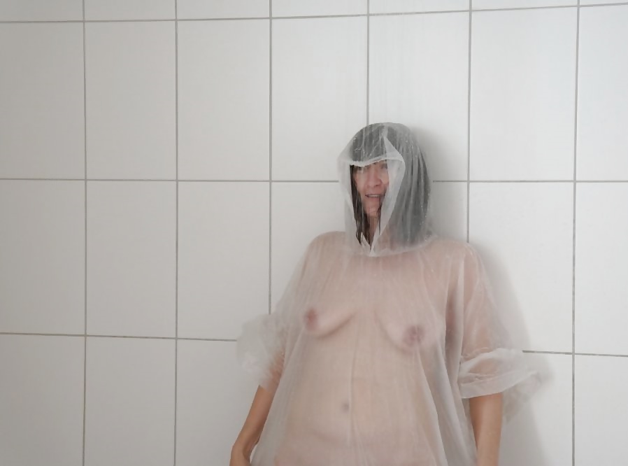 Porn image raincoat in the shower