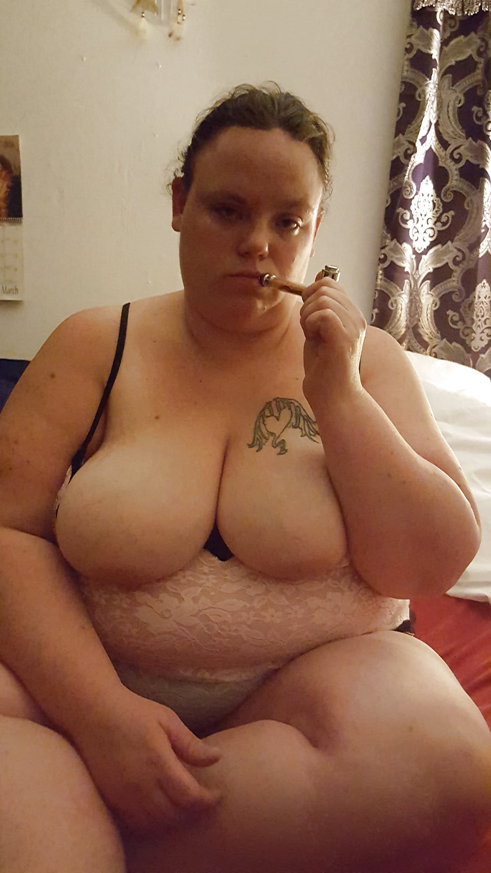 Porn image wifey with her pipe.