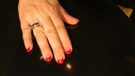 black balloon golden heels red fingernails         