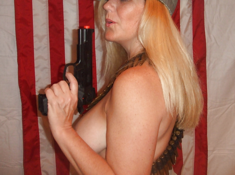 Porn image Mrs. Betty Boobman-fun with a toy gun