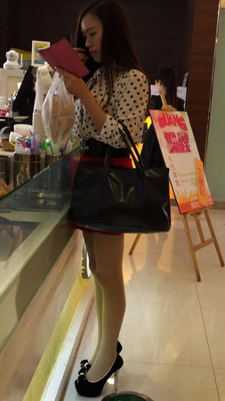 Pretty chinese girl in public