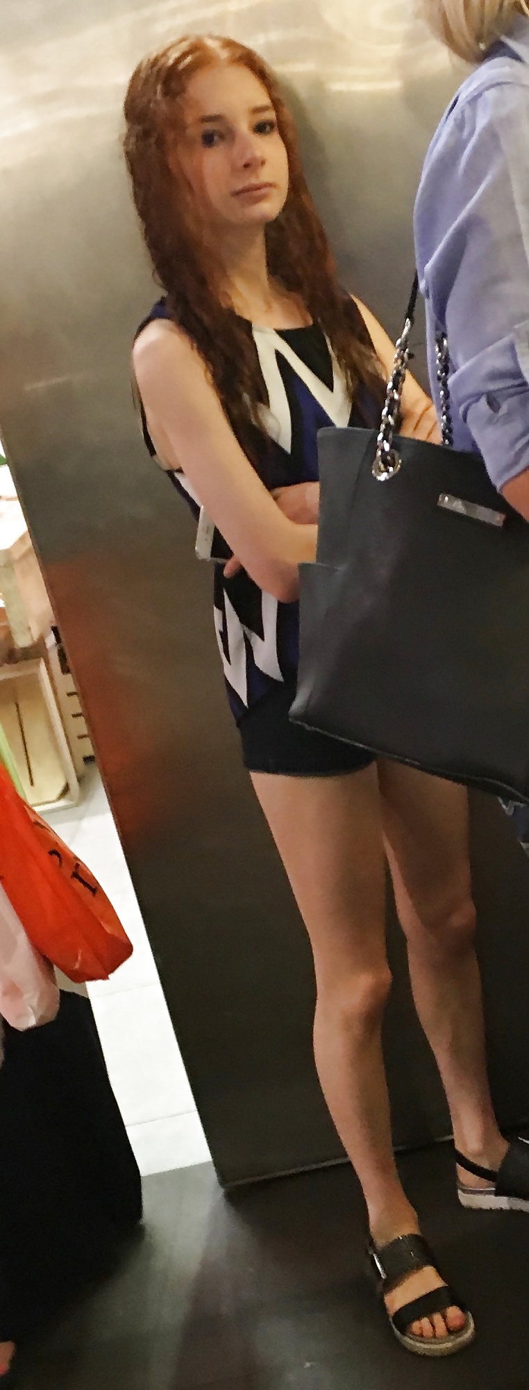 Porn image Tiny redhead mall teen in tiny shorts with a tiny ass