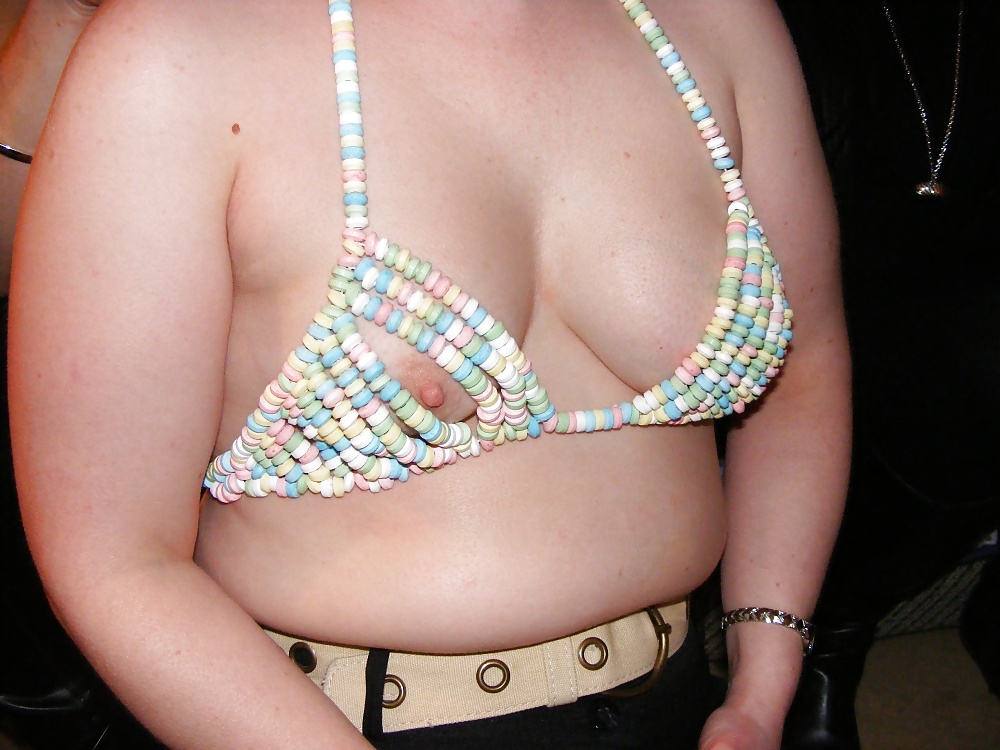 Porn image Fondling through a candy bra