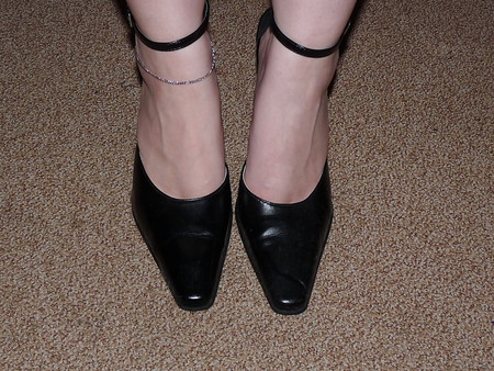 wifes black leather heels barefeet legs