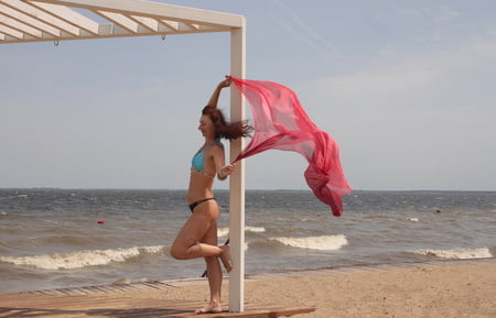 red shawl on windy weather         