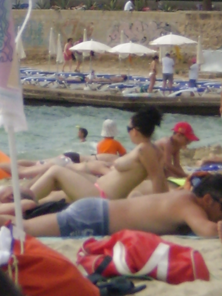 Porn image Holidays in Mallorca summer '07 - Topless beach girls
